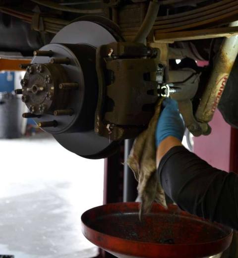 Auto car Maintenance at Robalino's Auto Center Mechanic working on a car engine at Robalino's Auto Center